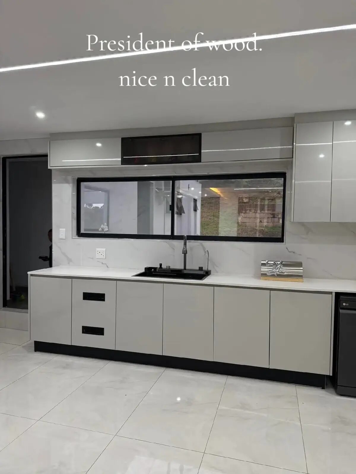 Clean grey kitchen with white countertops
