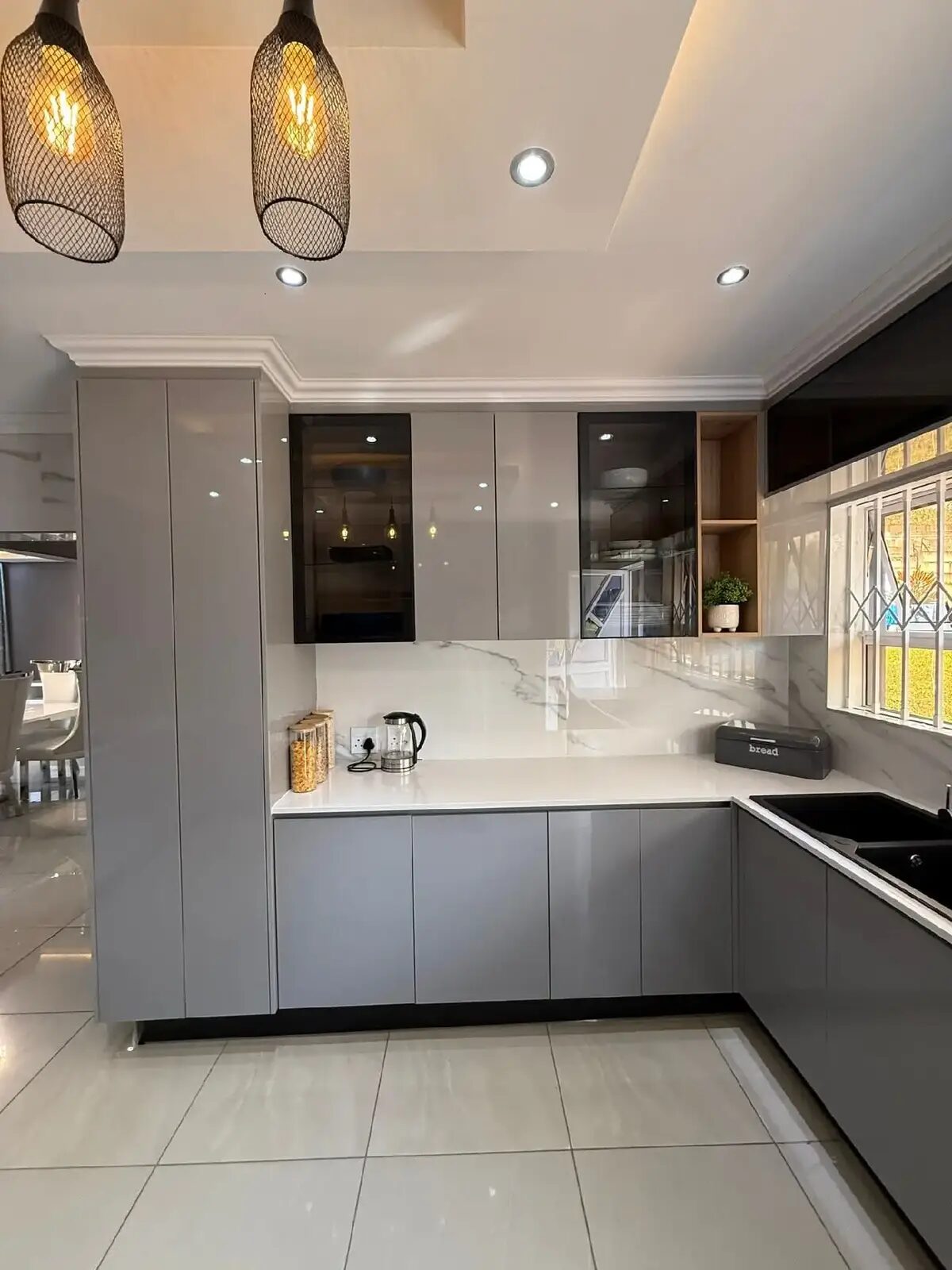 Backlit black-framed glass display cabinetry