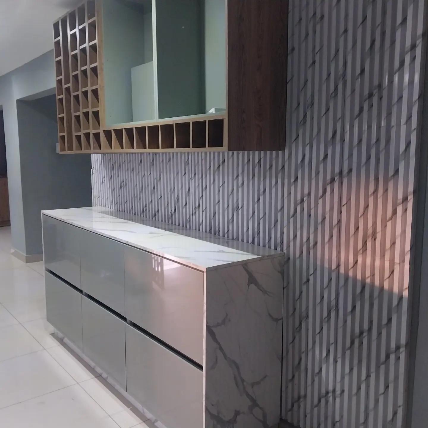 Dark TV unit with marble feature backdrop